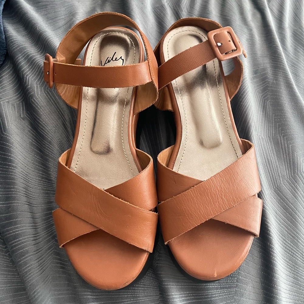 Real leather camel sandals with black platform.